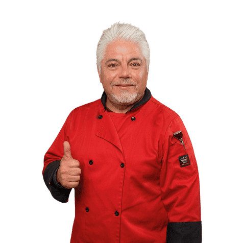 Juan's Authentic Mexican Restaurant Mississippi - A male chef in a red double-breasted chef coat giving a thumbs up.
